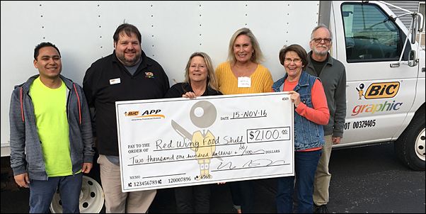 BIC Graphic associates delivered the food and funds collected on November 15.