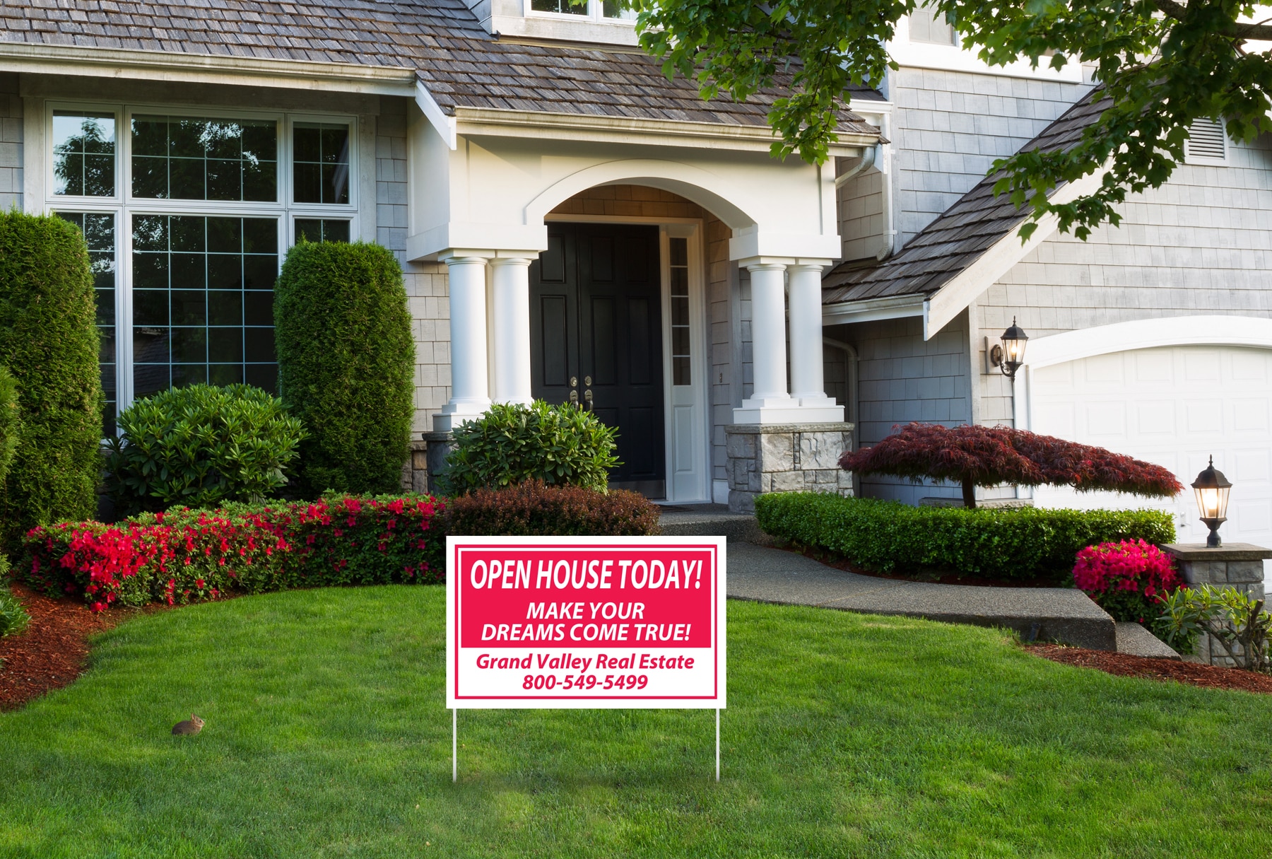 Beautiful home exterior during late spring season with clean landscape