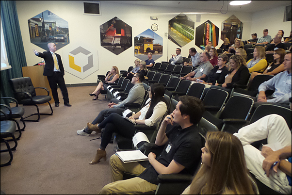 PPAI Diversity Development and Engagement Manager Seth Barnett speaks with an audience of PMANC members on selling to Millennial buyers.
