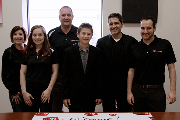 PPAI President and CEO Paul Bellantone, CAE, (second right) and his son Ben (center) met with Webb Company President Dan Webb (right), Distributor Relations Manager Patty Batalden (left), Sales and Marketing Administrator Sarah Hobson (second left) and National Key Account Manager Dan Ball, MAS, and toured the supplier's facilities.