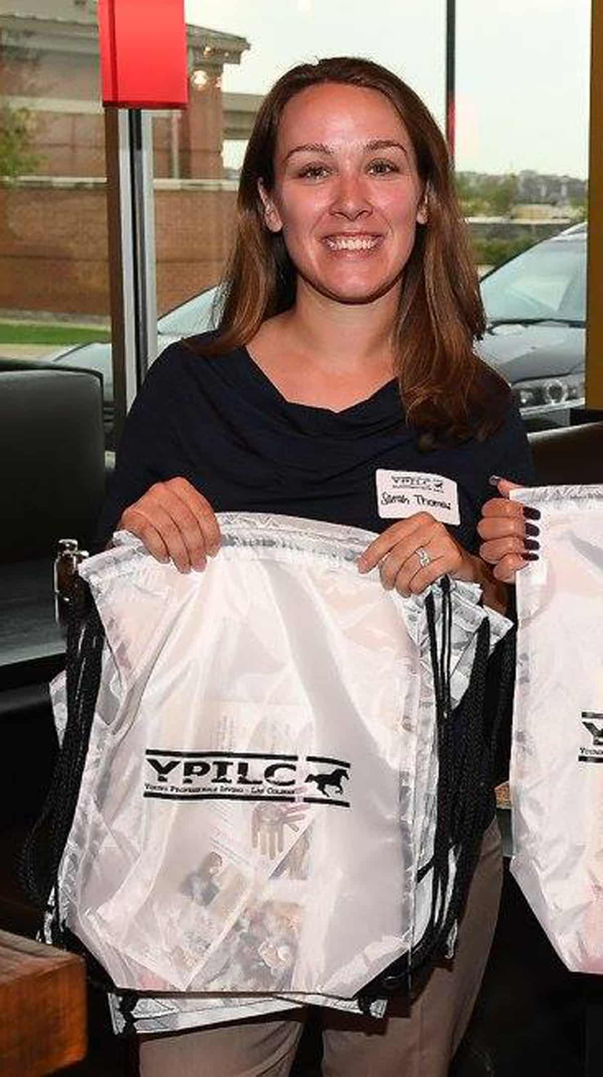 ypilc-pic_with-bag