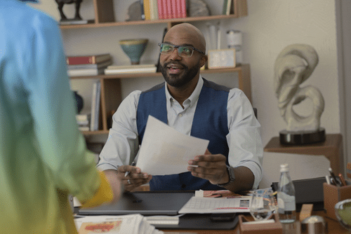 MAX image: On “Hacks,” Deborah Vance presents her business manager, Marcus, with printouts of unauthorized merch listings and demands that he get to the bottom of it.
